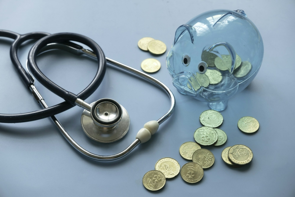 Concept of saving for gallbladder removal surgery costs or expense and financial checkup.